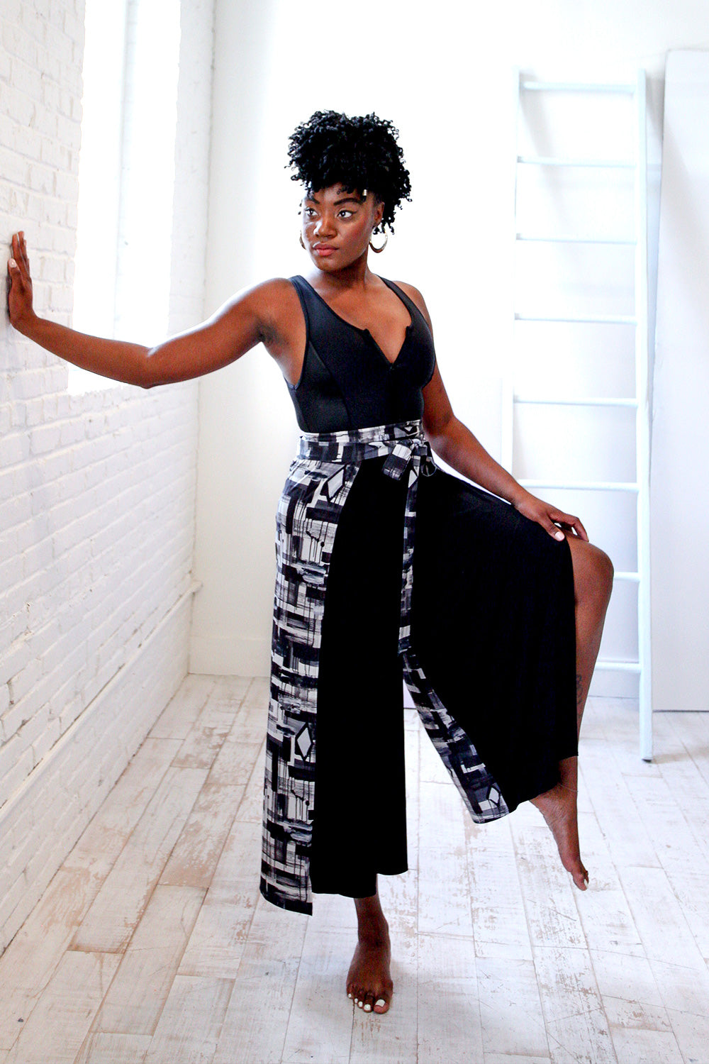 black woman wearing wrap pant