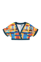 front of patterned crop top
