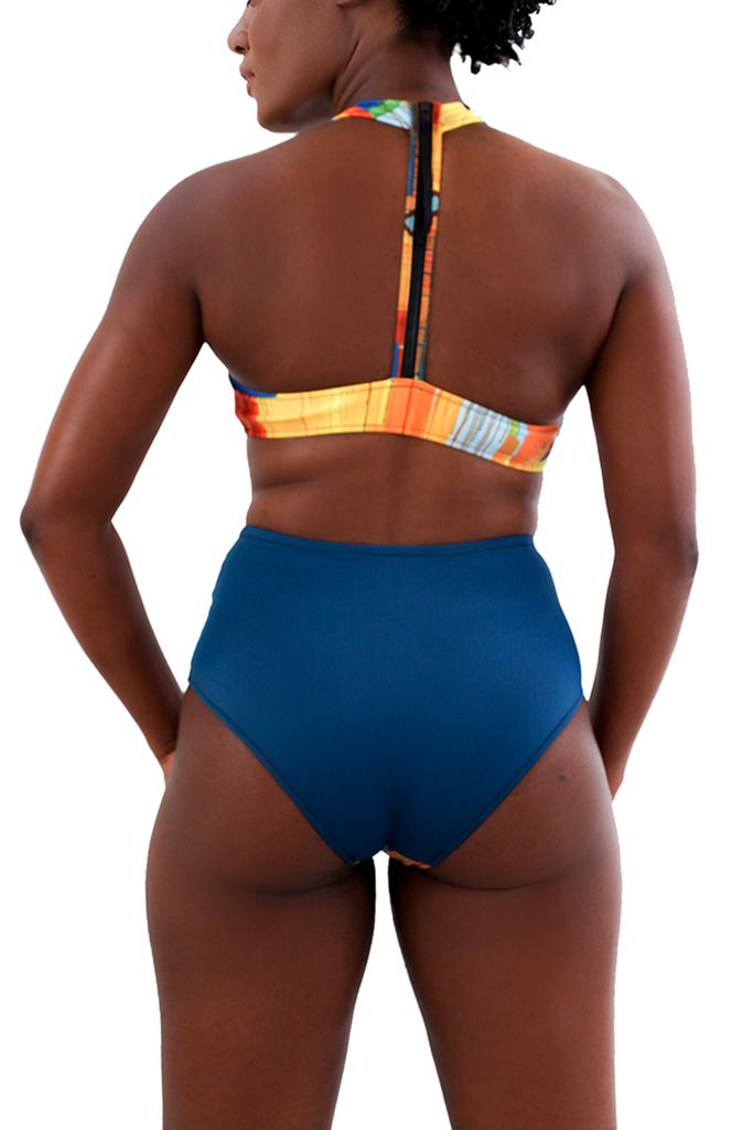 patterned active halter top with blue bikini bottoms