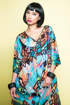 model wearing patterned kaftan